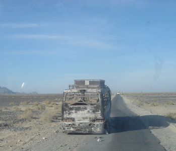 A dead Hino bus on the route near Dalbandin
